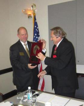 ALPBA President Donald Scott presents Juan Rodriquez, President of the Jefferson/Shelby Chapter, with the ALPBA Member of the Year award.