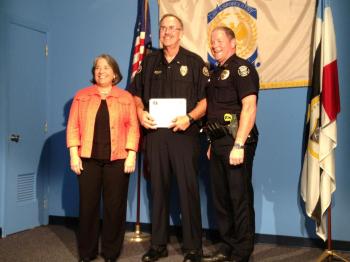 Lt. Gene Sasscer pictured with Knoxville Mayor Madeline Rogero and Knoxville Police Chief David Rausch 